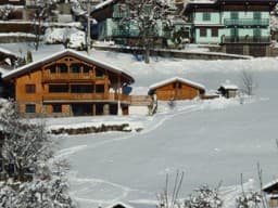 The chalet in summer and winter 2