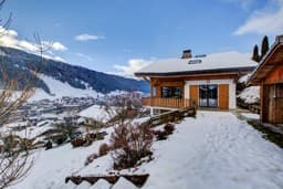 The chalet in summer and winter 6