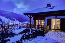 The chalet in summer and winter 9